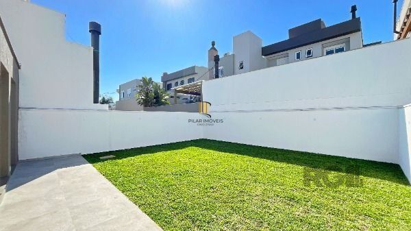 Casa Condominio em Porto Alegre, no bairro Hípica, com 3 dormitório(s), e 3 banh