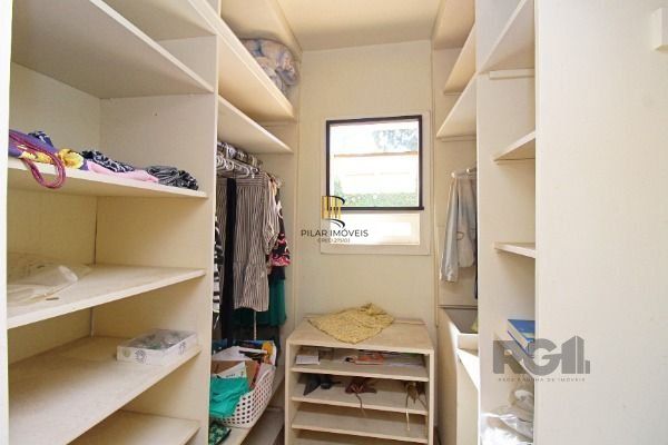 Casa Condominio em Porto Alegre, no bairro Cavalhada, com 4 dormitório(s), e 4 b