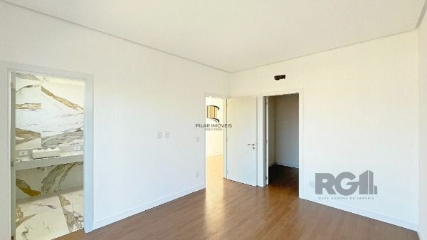 Casa Condominio em Porto Alegre, no bairro Hípica, com 3 dormitório(s), e 3 banh