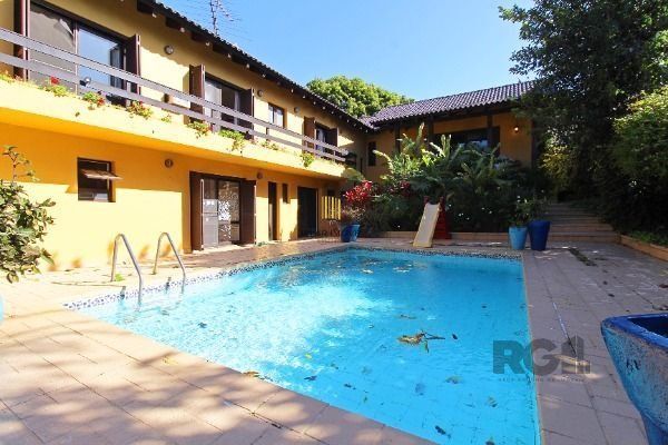 Casa Condominio em Porto Alegre, no bairro Cavalhada, com 4 dormitório(s), e 4 b