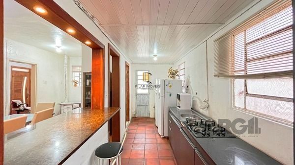 Casa em Porto Alegre, no bairro Cavalhada, com 4 dormitório(s), e 4 banheiros, à