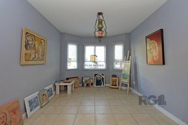 Casa Condominio em Porto Alegre, no bairro Guarujá, com 3 dormitório(s), e 3 ban