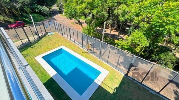 Casa em Porto Alegre, no bairro Jardim Isabel, com 3 dormitório(s), e 3 banheiro