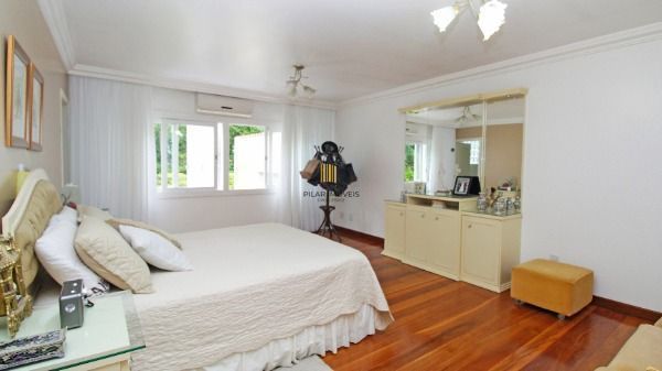 Casa Condominio em Porto Alegre, no bairro Cascata, com 3 dormitório(s), e 3 ban