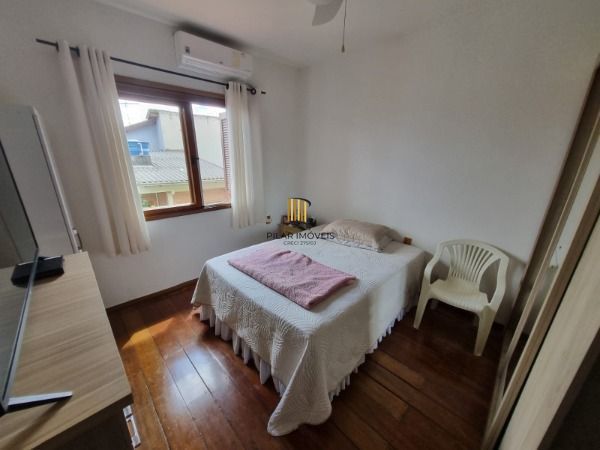 Sobrado em Porto Alegre, no bairro Ponta Grossa, com 4 dormitório(s), e 4 banhei