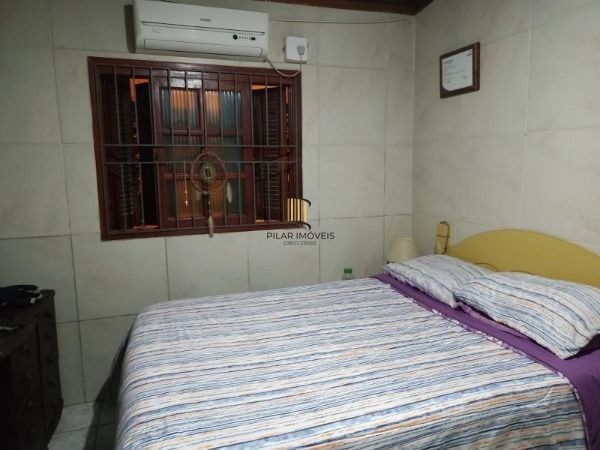 Casa em Porto Alegre, no bairro Belém Novo, com 4 dormitório(s), e 4 banheiros, 