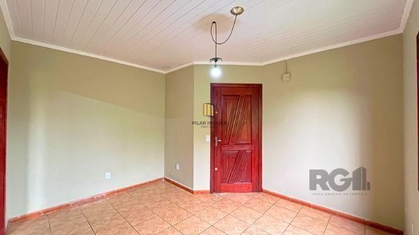 Casa em Porto Alegre, no bairro Vila Nova, com 2 dormitório(s), à venda.