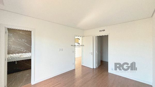 Casa Condominio em Porto Alegre, no bairro Hípica, com 3 dormitório(s), e 3 banh
