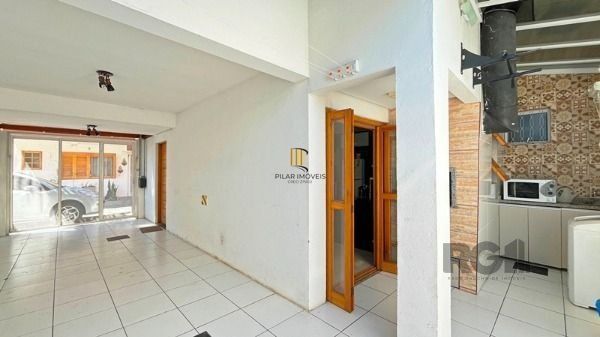 Casa Condominio em Porto Alegre, no bairro Tristeza, com 3 dormitório(s), e 3 ba