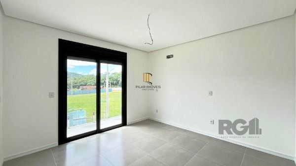 Casa Condominio em Porto Alegre, no bairro Campo Novo, com 3 dormitório(s), e 3 