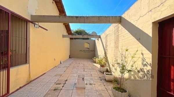 Casa 4 dormitórios à venda Restinga Porto Alegre/RS