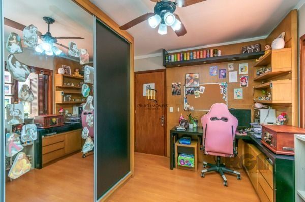 Residência com 4 dormitórios á venda no Bairro Jardim Izabel.