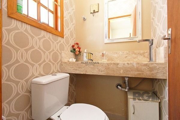 Casa Condominio em Porto Alegre, no bairro Tristeza, com 3 dormitório(s), e 3 ba