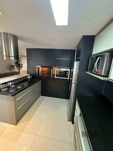 Casa Condominio em Porto Alegre, no bairro Tristeza, com 3 dormitório(s), e 3 ba