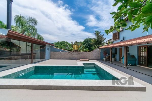 Residência com 4 dormitórios á venda no Bairro Jardim Izabel.