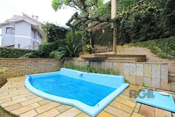 Casa Condominio em Porto Alegre, no bairro Sétimo Céu, com 4 dormitório(s), e 4 