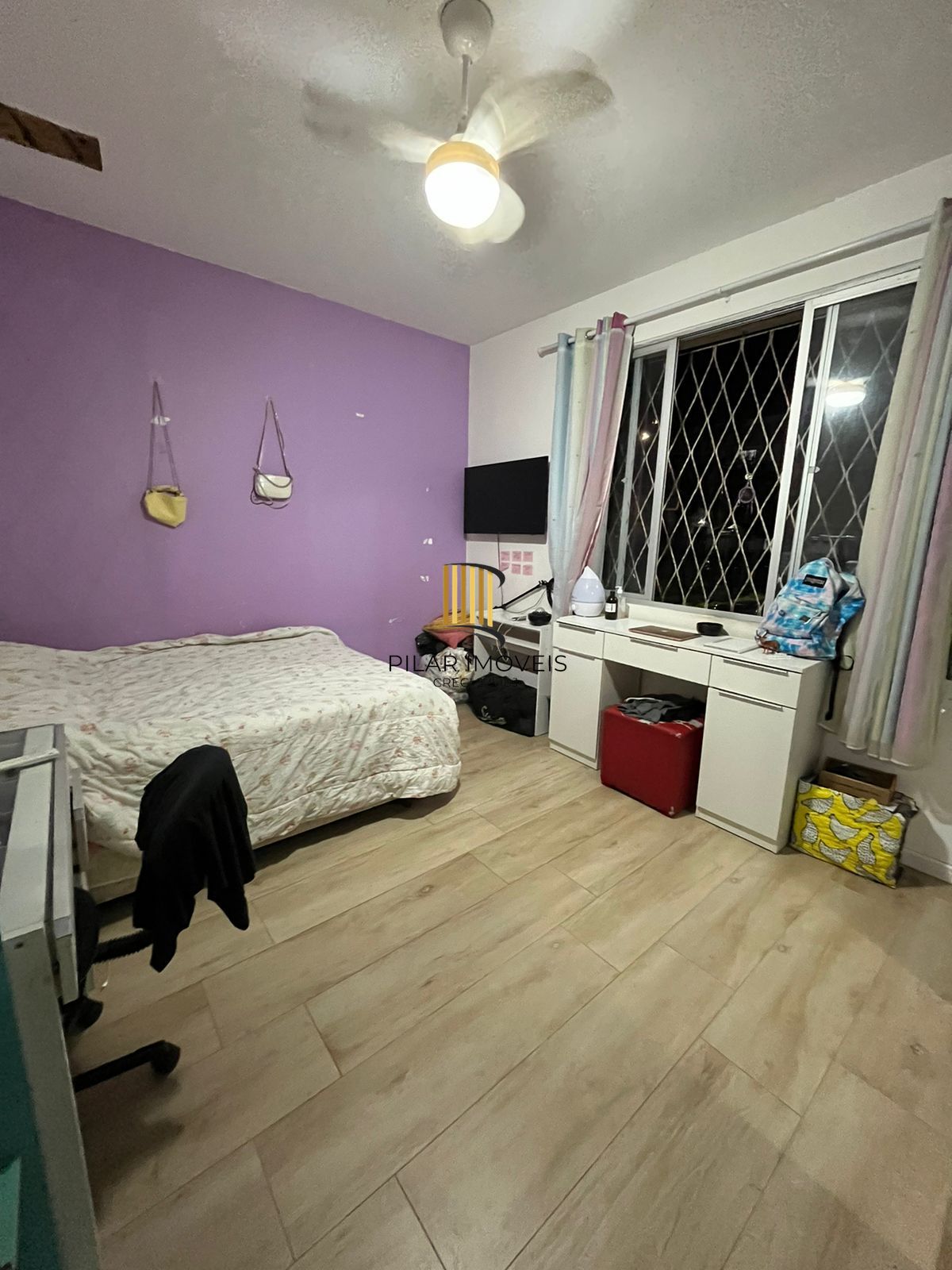 Ótimo apartamento térreo 2 dormitórios, com estacionamento, no coração do Bairro Menino Deus.
