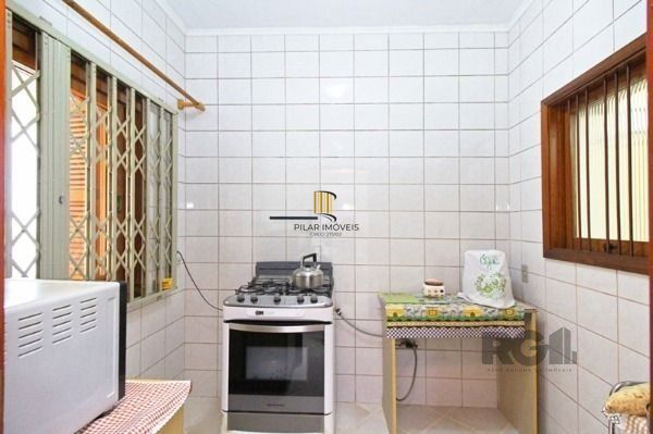 Casa em Porto Alegre, no bairro Tristeza, com 3 dormitório(s), e 3 banheiros, à 