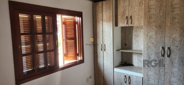 Sobrado em Porto Alegre, no bairro Vila Nova, com 3 dormitório(s), e 3 banheiros