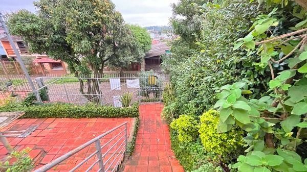 Casa em Porto Alegre, no bairro Cavalhada, com 4 dormitório(s), e 4 banheiros, à