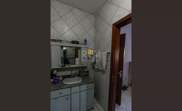 Casa em Porto Alegre, no bairro Cavalhada, com 5 dormitório(s), e 5 banheiros, à