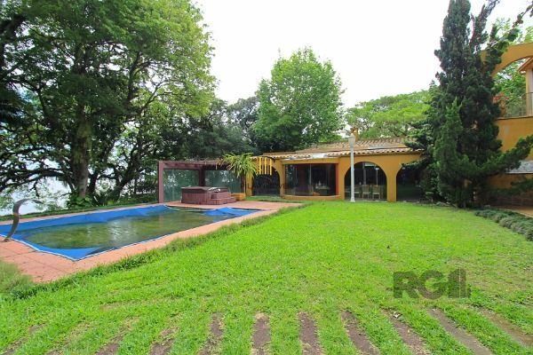 Casa em Porto Alegre, no bairro Pedra Redonda, com 7 dormitório(s), e 7 banheiro
