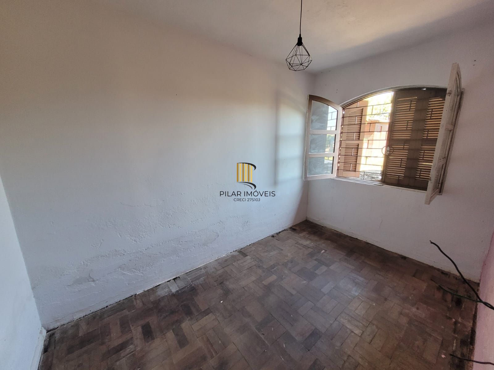 Ótimo terreno com casa na Ponta Grossa.