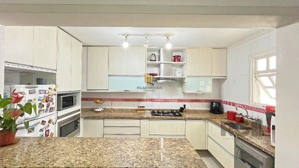 Casa 4 dormitórios à venda Camaquã Porto Alegre/RS