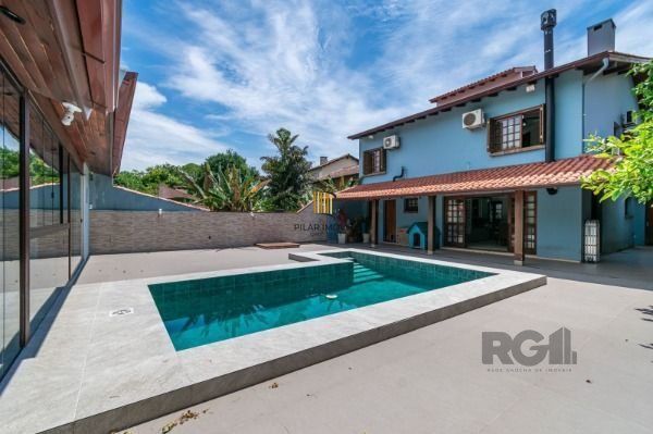 Residência com 4 dormitórios á venda no Bairro Jardim Izabel.