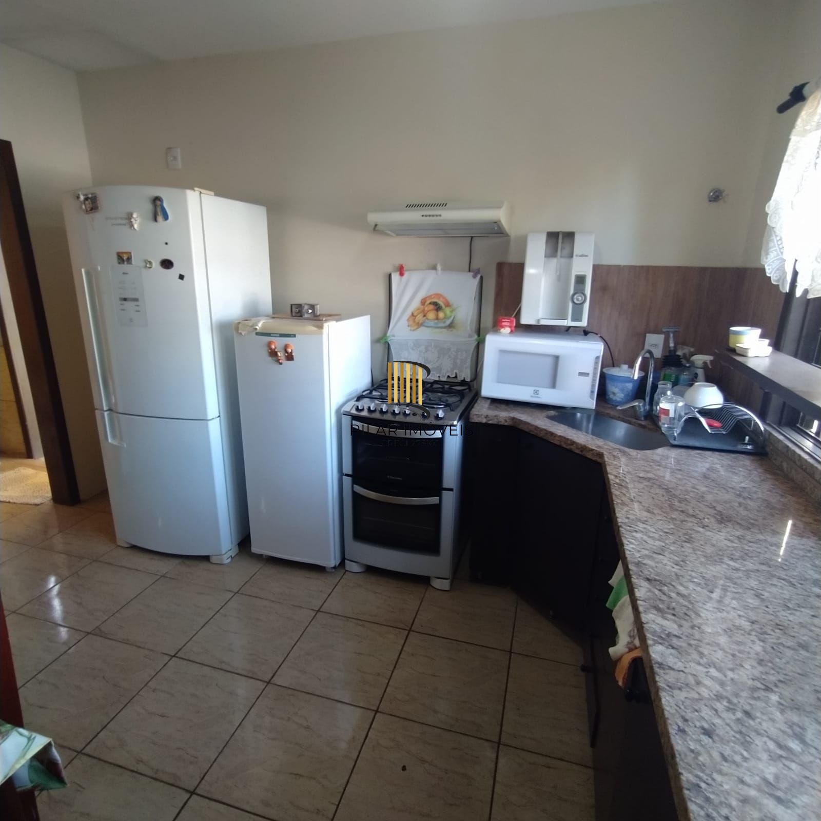 Casa 2 quartos, suíte, cozinha grande, lavanderia, aquecimento a gas, pátio grande