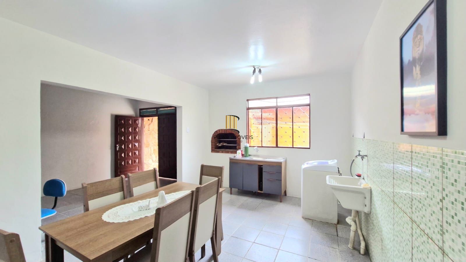 Casa a venda com 3 dormitórios no Centro de Guaíba.