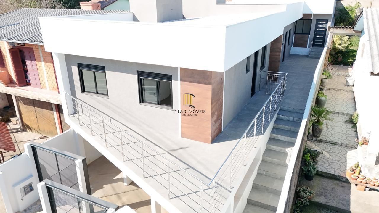 Casa 2 Dormitórios com Suíte | Garagem para 2 Carros | Ótima Localização em Canoas - Pilar Imóveis