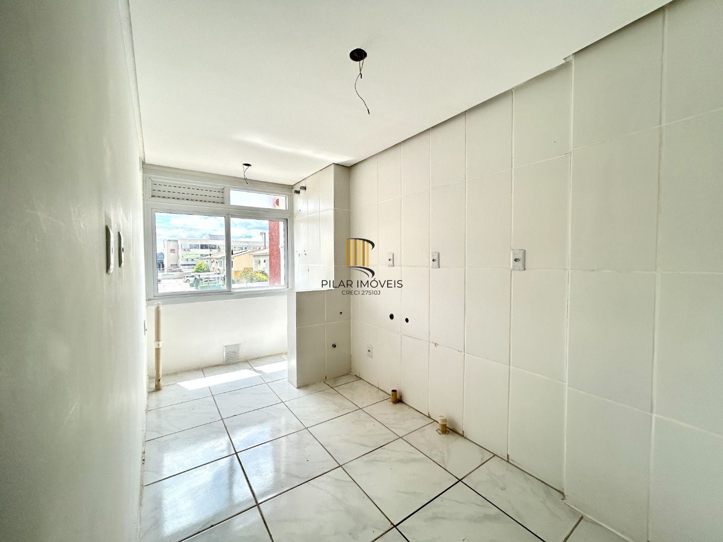 Apartamento com 2 dormitórios à venda, 56 m² por R$ 270.000,00 - Marechal Rondon - Canoas/RS