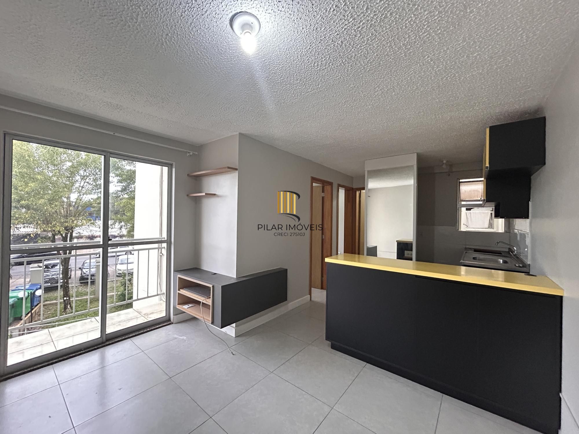 Apartamento 2 dormitórios com sacada e garagem | Condomínio com portaria 24h e lazer - Pilar Imóveis