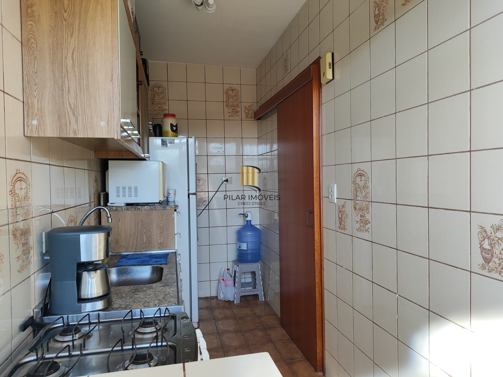 Apartamento dois dormitórios , com vaga de garagem, Bairro Vila Nova!