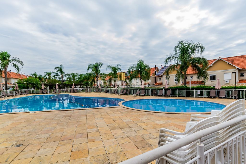 CASA EM CONDOMINIO COM 4 DORMITÓRIOS E DUAS VAGAS COBERTAS NO 