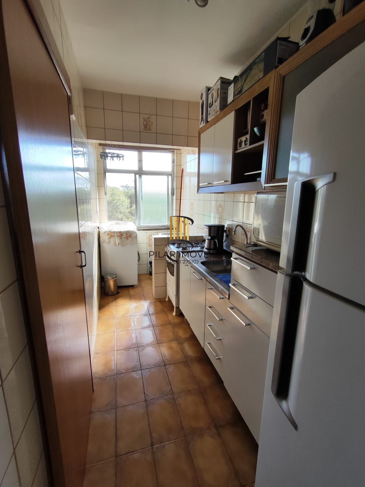 Apartamento dois dormitórios , com vaga de garagem, Bairro Vila Nova!