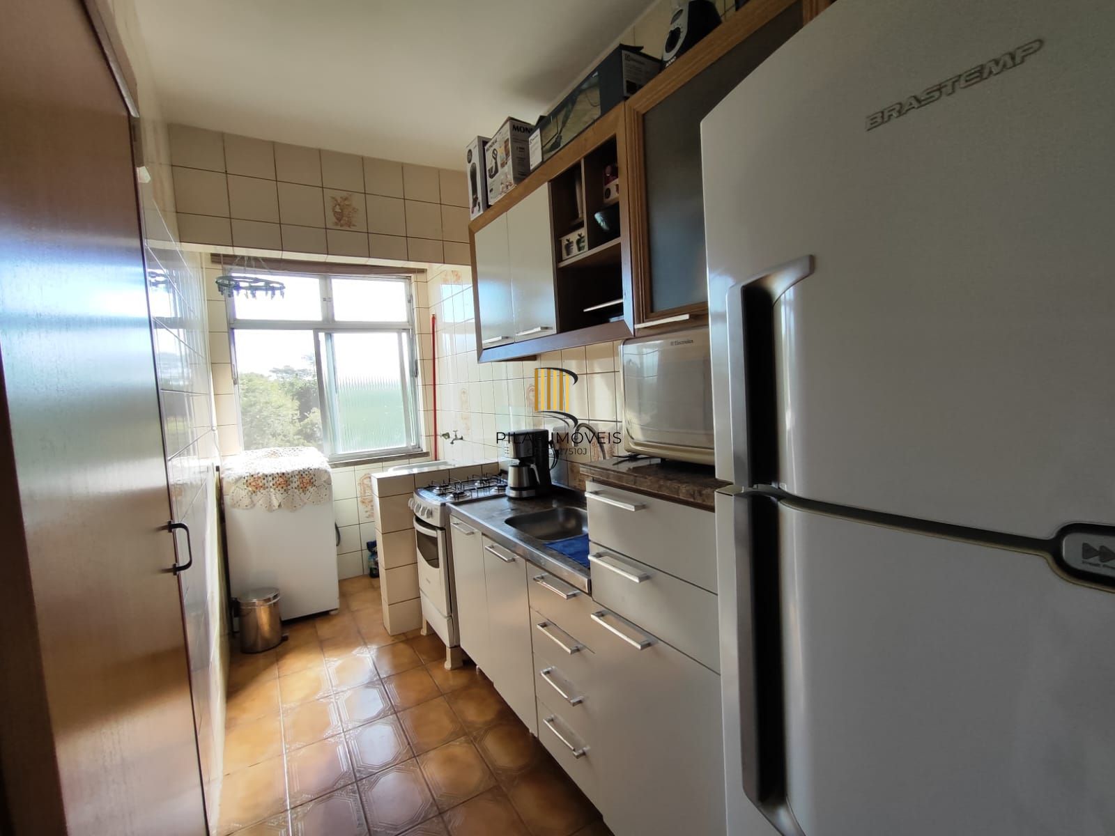 Apartamento dois dormitórios , com vaga de garagem, Bairro Vila Nova!