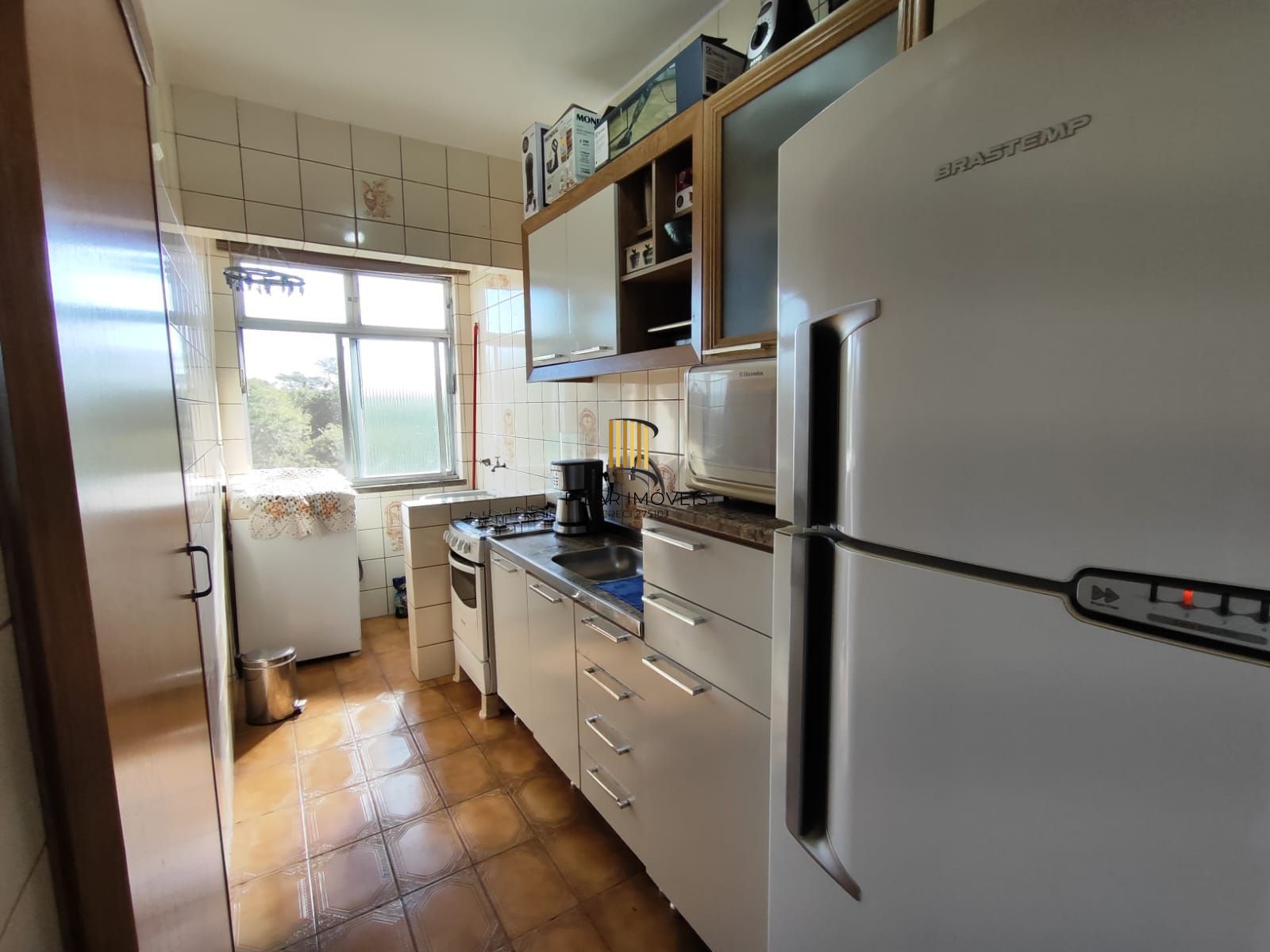 Apartamento dois dormitórios , com vaga de garagem, Bairro Vila Nova!