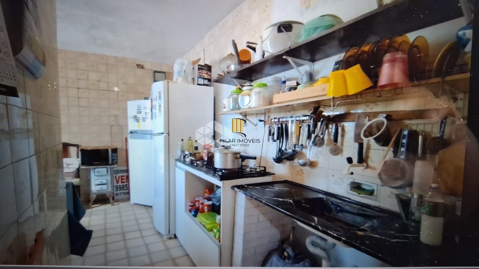 CASA AMPLA, 2 DORMITÓTIOS, 1SUÍTE, SALA, COZINHA, BANHEIRO SOCIAL , 2 VAGAS DE GARAGEM E ÓTIMA LOCALIZAÇÃO!
