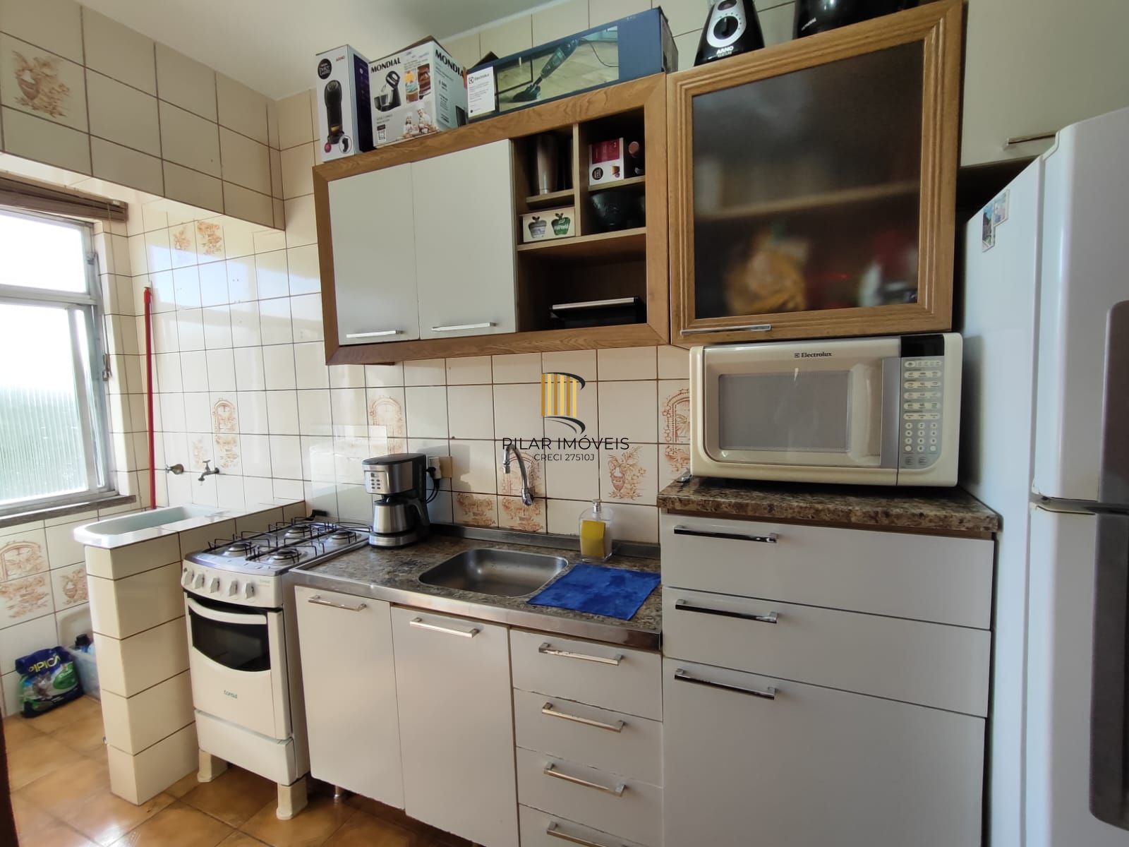 Apartamento dois dormitórios , com vaga de garagem, Bairro Vila Nova!