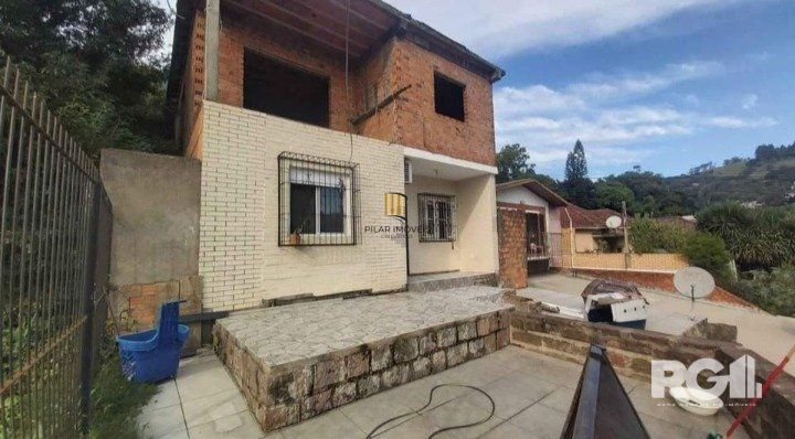 Casa 3 dormitórios no bairro Glória - Pilar Imóveis