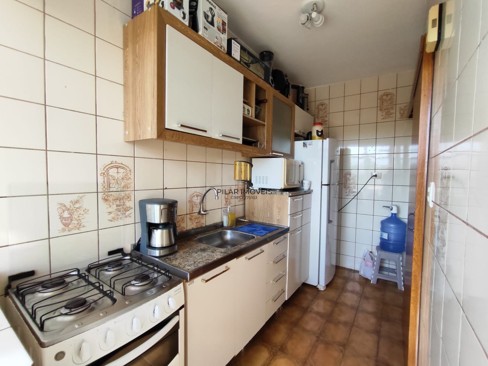 Apartamento dois dormitórios , com vaga de garagem, Bairro Vila Nova!