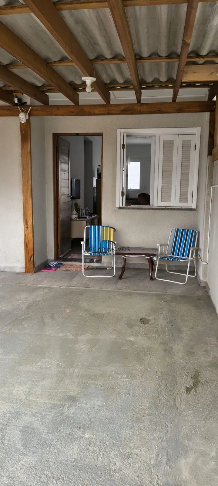 Casa na praia com 2 dormitórios e vaga — aceita troca por apartamento em Porto Alegre