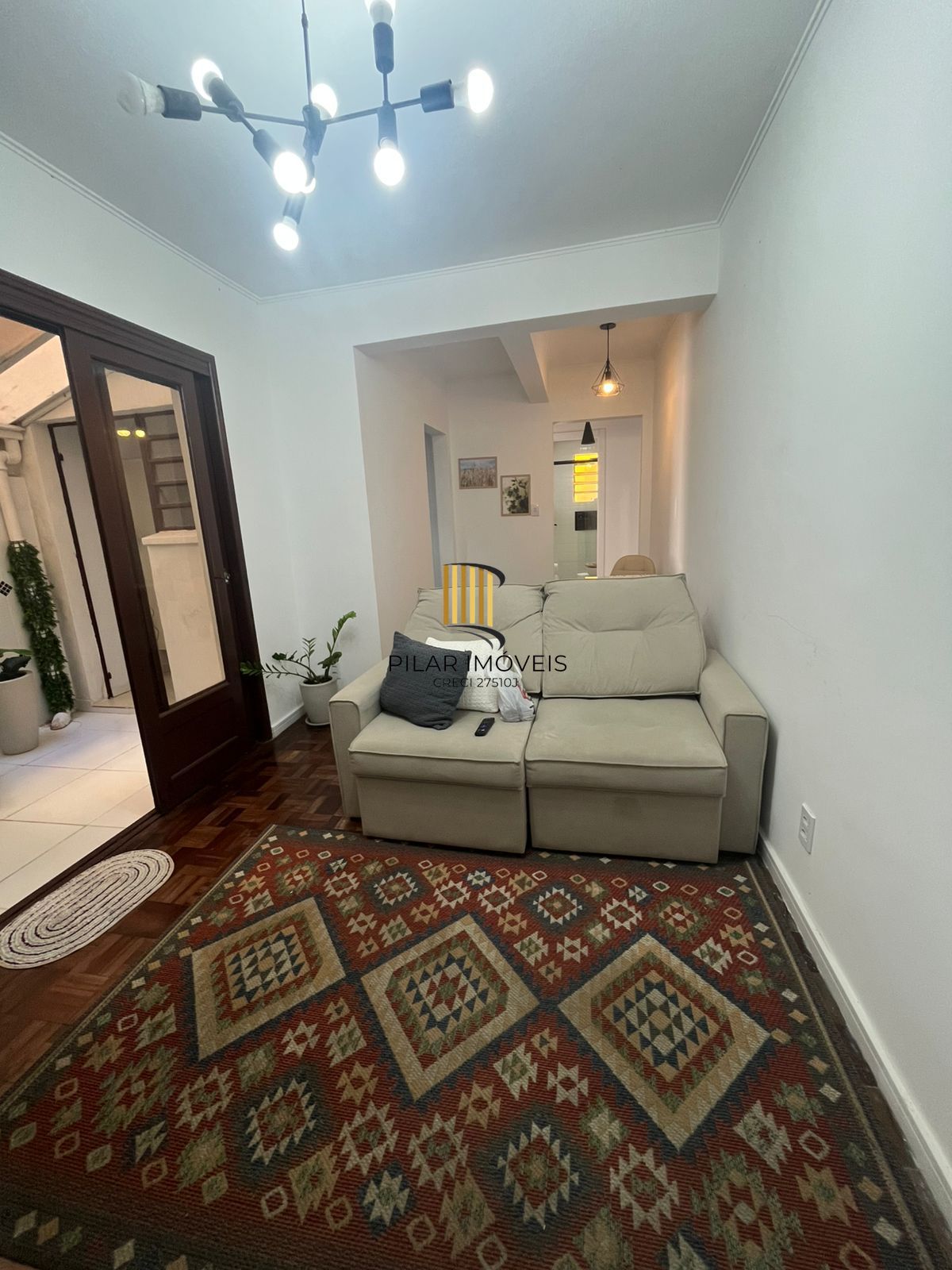 Apartamento mobiliado no Navegantes – 61,15m² privativos, ideal para morar ou investir - Pilar Imóveis