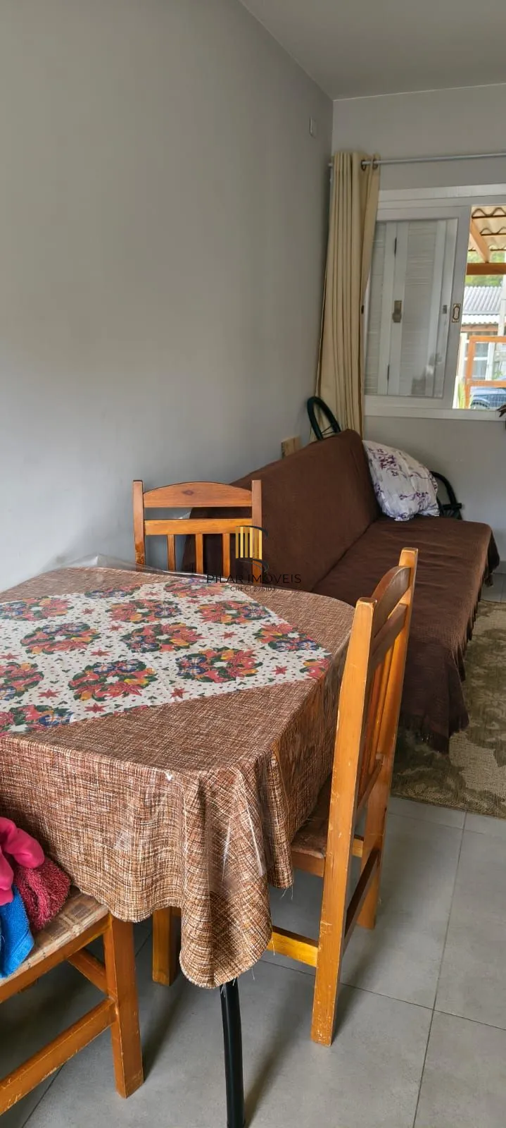 Casa na praia com 2 dormitórios e vaga — aceita troca por apartamento em Porto Alegre