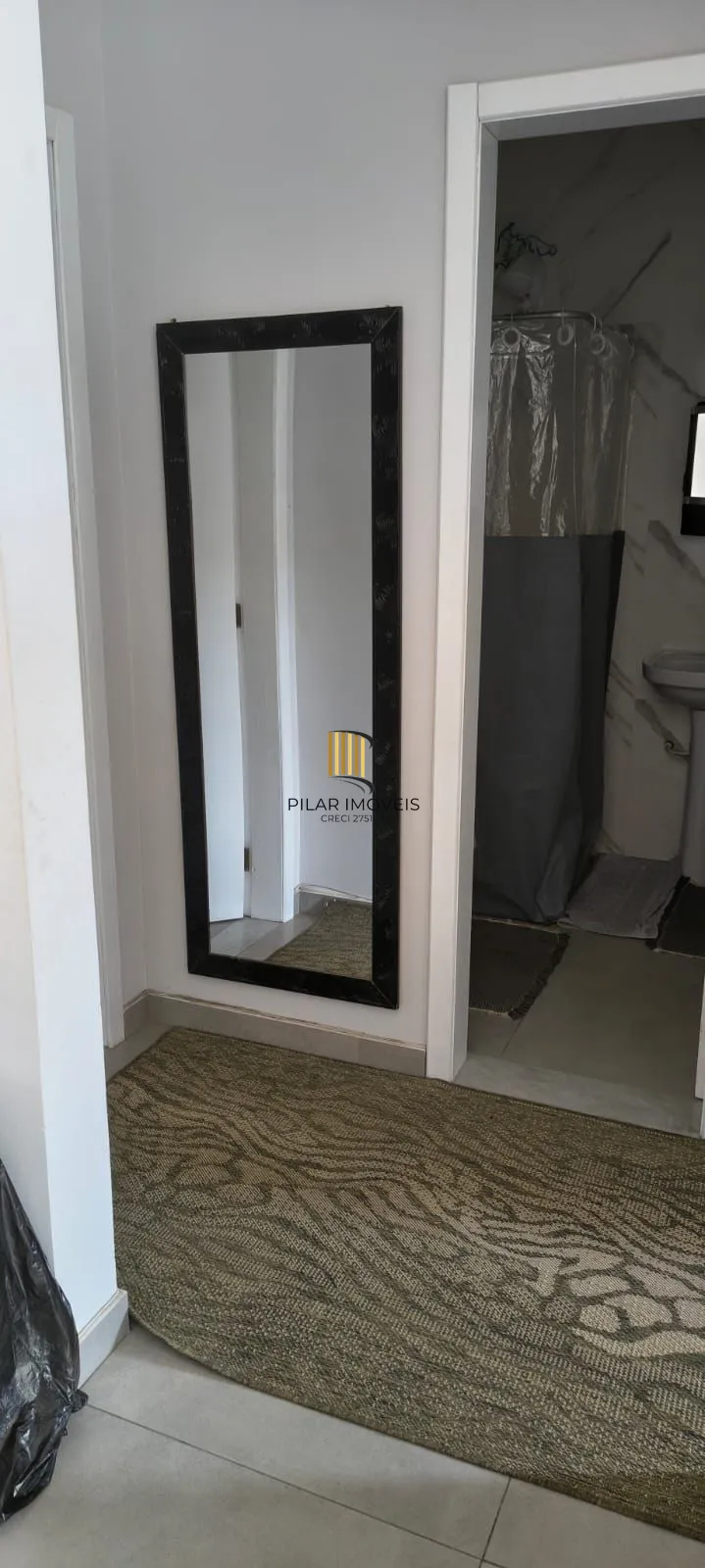 Casa na praia com 2 dormitórios e vaga — aceita troca por apartamento em Porto Alegre