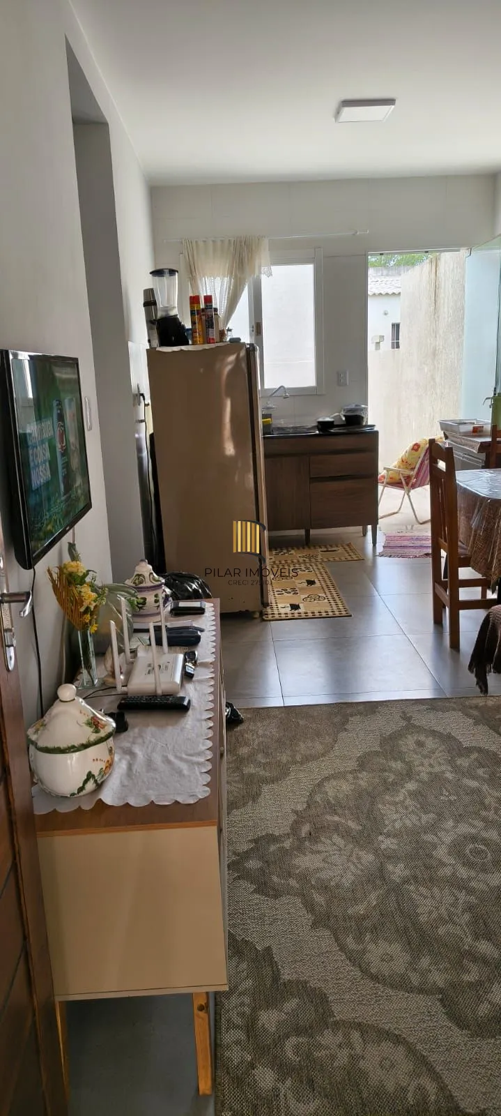 Casa na praia com 2 dormitórios e vaga — aceita troca por apartamento em Porto Alegre