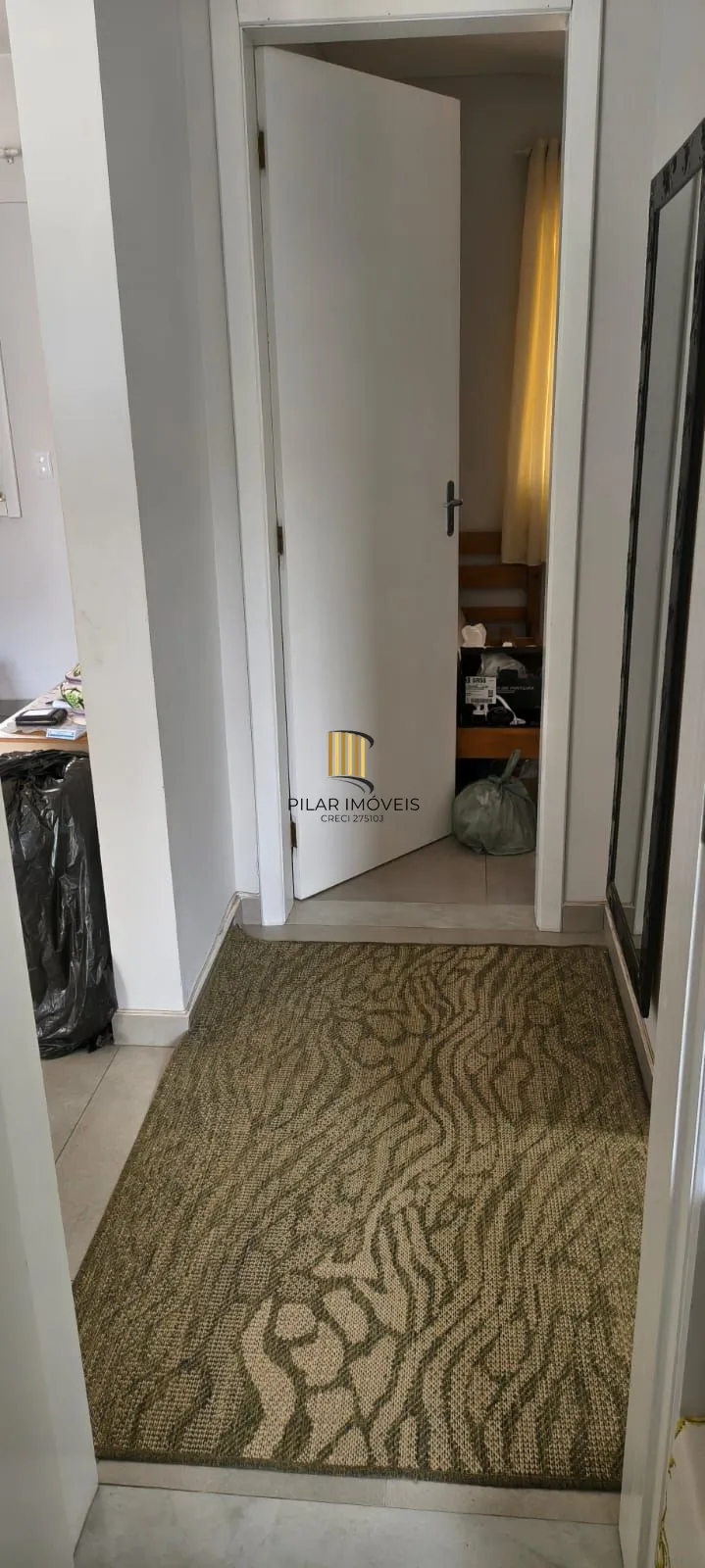 Casa na praia com 2 dormitórios e vaga — aceita troca por apartamento em Porto Alegre