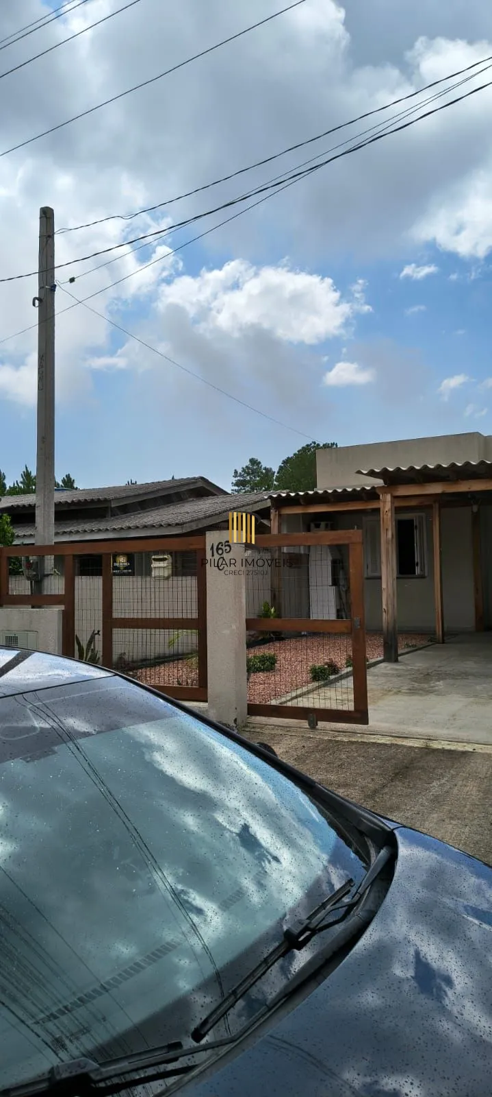 Casa na praia com 2 dormitórios e vaga — aceita troca por apartamento em Porto Alegre